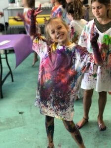 summer camp painting classes where kids have fun with splatter paint in Jupiter FL